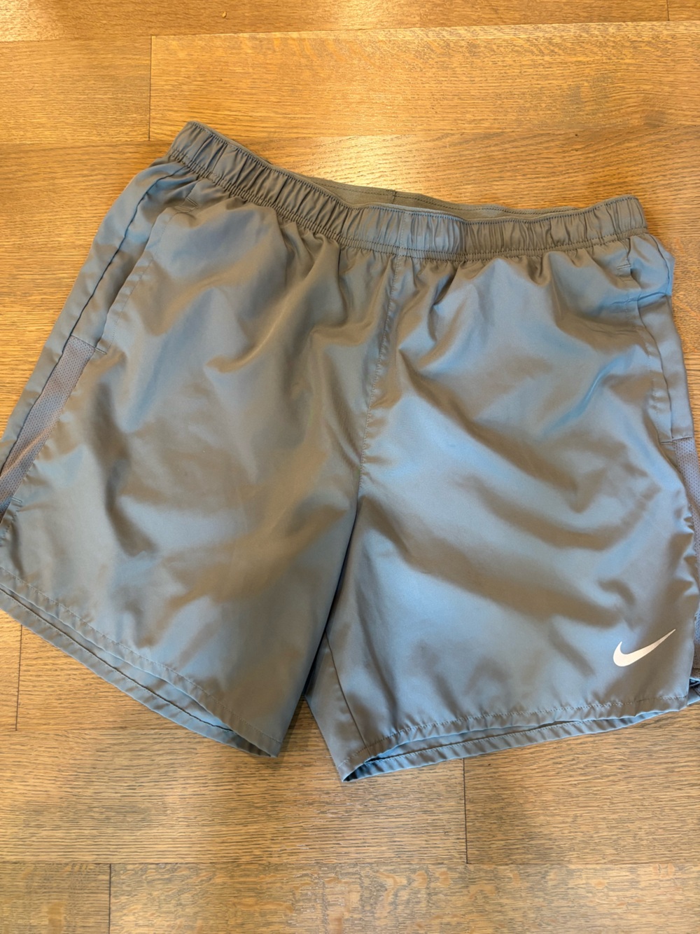 Nike Dri-FIT Athletic Shorts in Light Gray with Black Swoosh